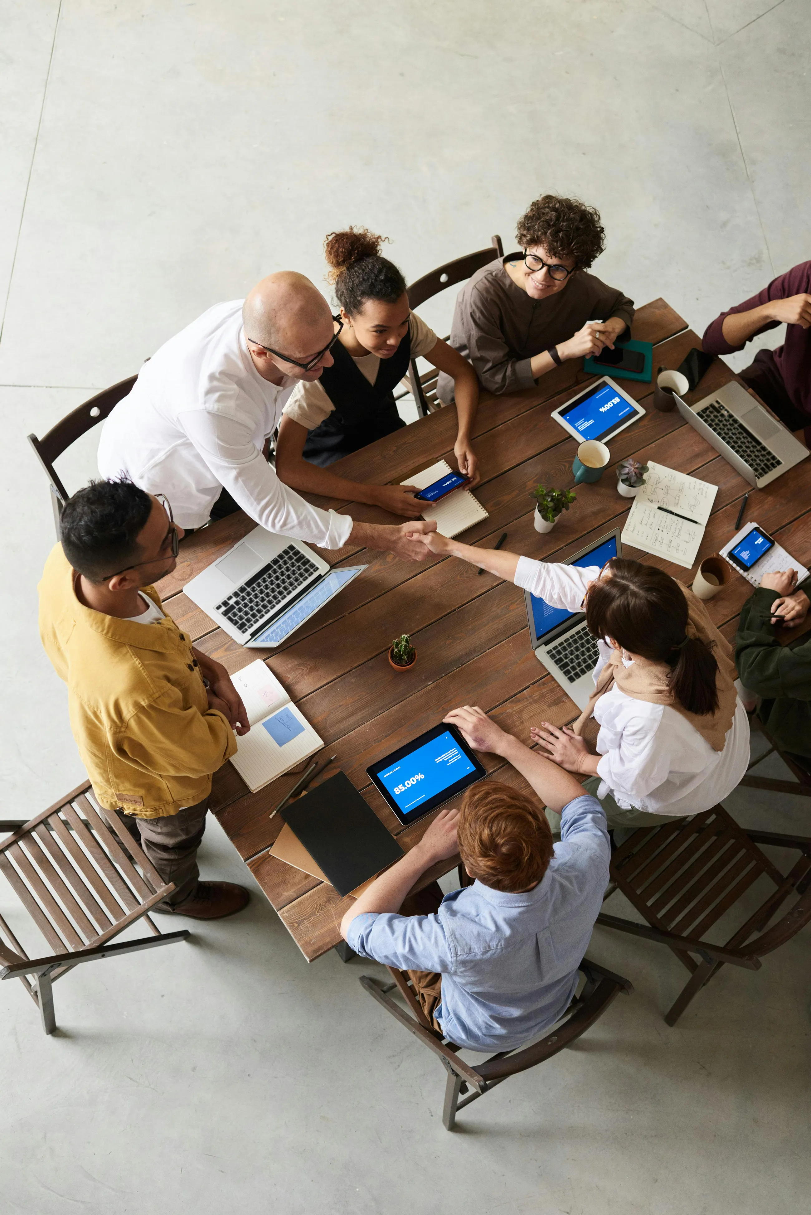 Executive team gathered around a table during a strategy workshop